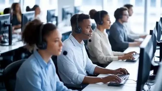 Call Center Jobs In United States - Modern call center setup in the United States with desks and computers