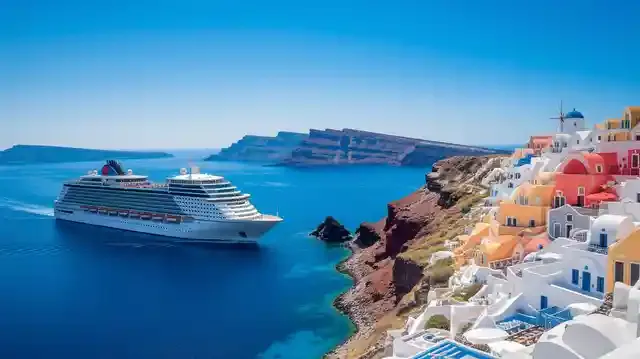 UK To Greece Cruises 2025/2026 - A cruise ship on turquoise Mediterranean waters next to a Greek island