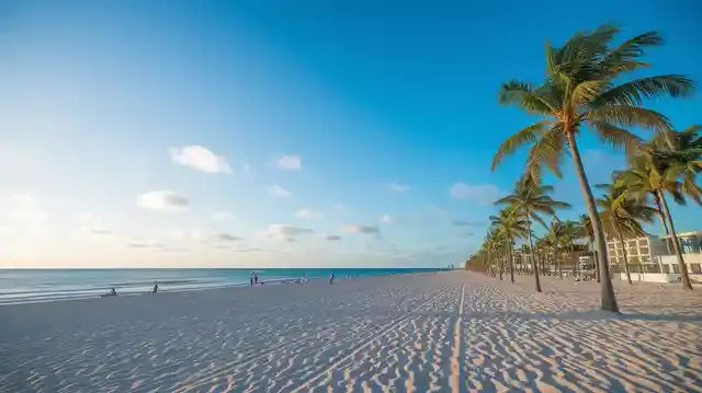 When Is The Cheapest Time To Travel To Miami - Tranquil Miami Beach with golden sands and palm trees